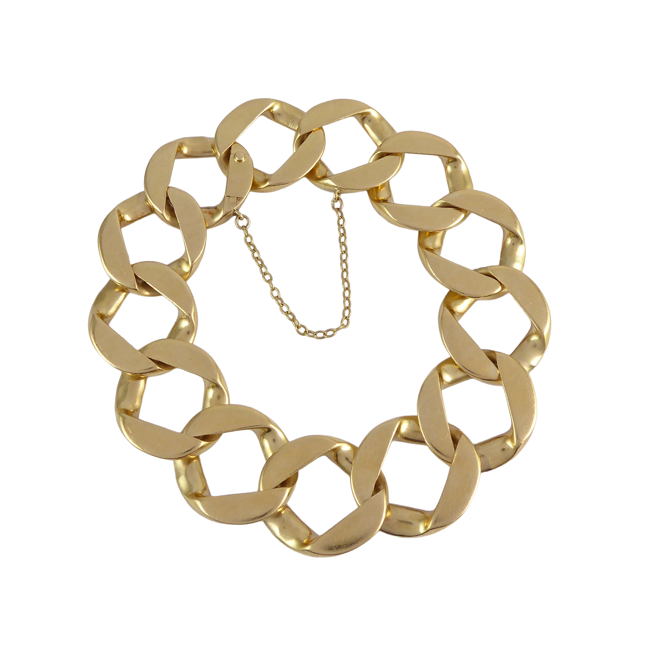 18ct gold large flattened curblink bracelet by Cartier, London, hallmarked for 1960,